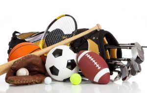 Assorted sports equipment on a white background