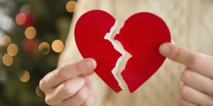 Studio Shot of female's hands holding broken heart