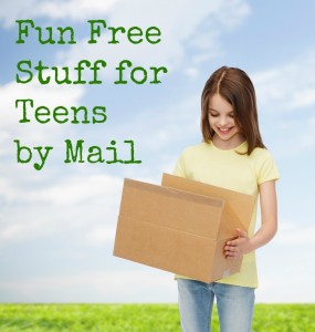 advertising, childhood, delivery, mail and people - smiling girl holding open cardboard box and looking into it over natural background